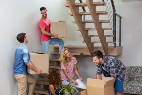Professional furniture movers handling items in Bishops Stortford