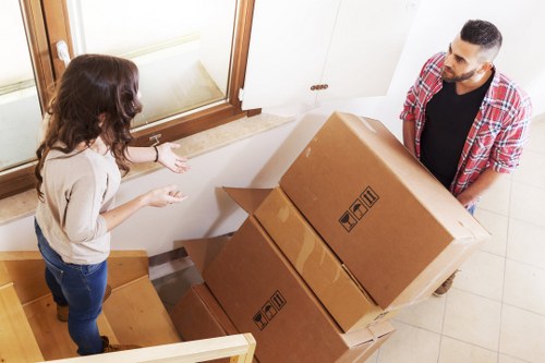 Professional movers handling furniture in Oxford